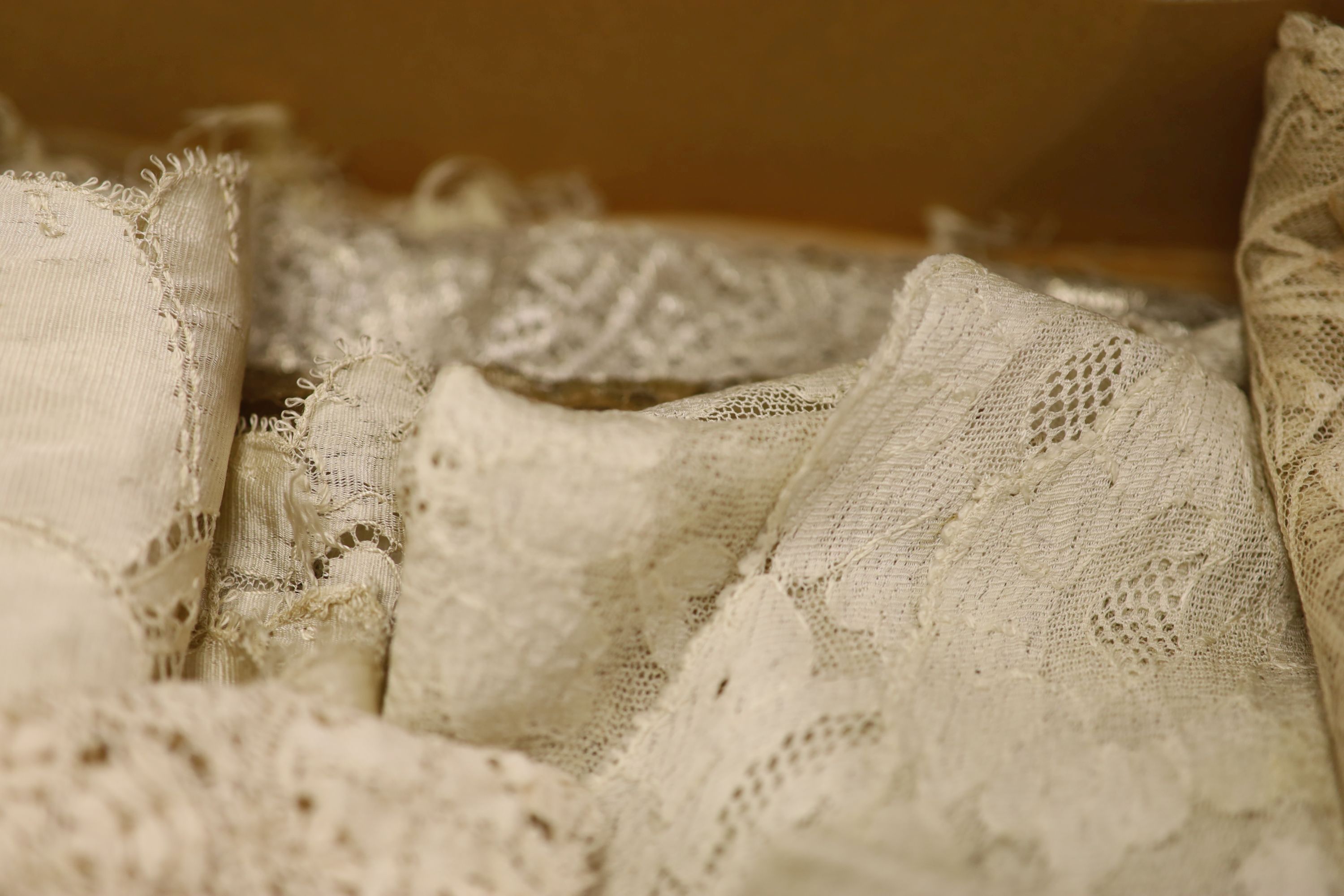 A silk lace stole, collar and Maltese collar, christening shawl, tape lace collar, a metallic gold and silver machine lace panel etc